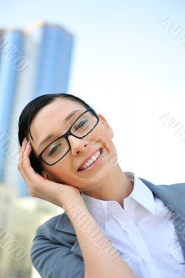 Closeup portrait of cute young business woman smiling