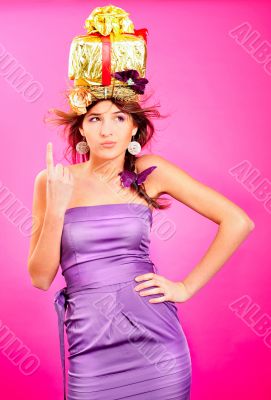 Young happy woman with a gift