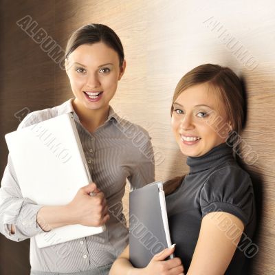 Portrait of two women in the hall.