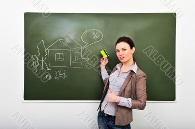 Closeup portrait of pretty young business woman against green bo