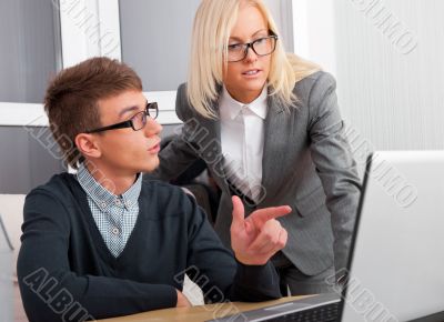 Young successful business people are working in the office.
