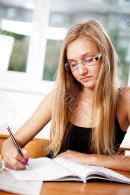 A portrait of a caucasian race school student at classroom