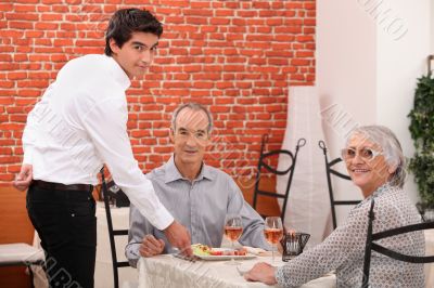 Elderly couple dining