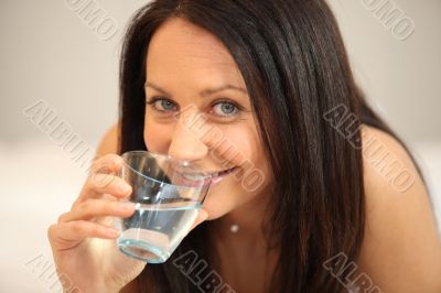 Woman with glass of water