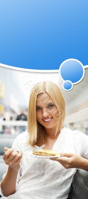 Portrait of young pretty smiling woman eating cake at shopping m