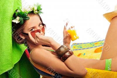 Portrait of young woman with beach umbrella 
