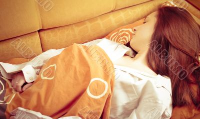 Closeup portrait of young pretty girl laying on </sp