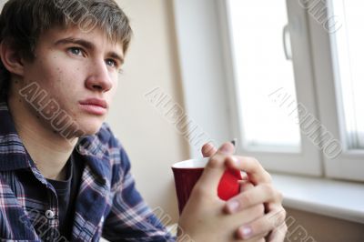 Happy young hand"magenta">some man at home