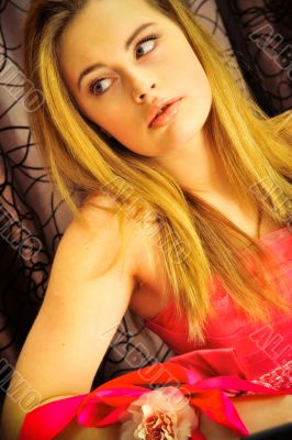 Closeup portrait of young pretty woman doing makeup and hairstyl