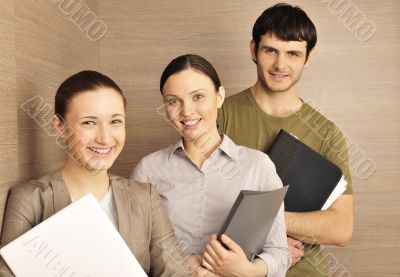 Portrait of three office workers.