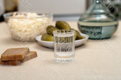 Vodka and snack.