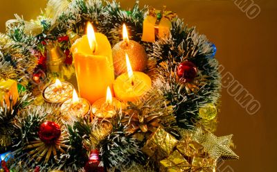 Christmas carol and burning candles