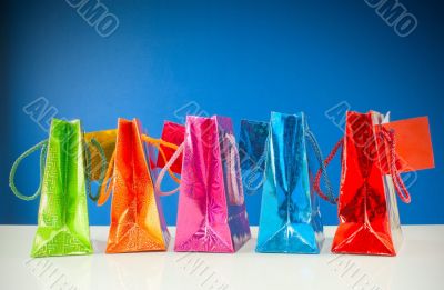 Row of colorful bags