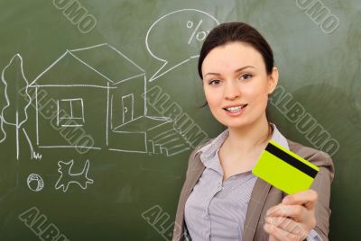 Closeup portrait of pretty young business woman against green bo