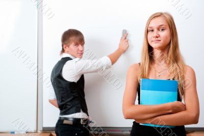 Portrait of college students making presentation </s