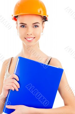 Portrait of a beautiful woman with orange helmet