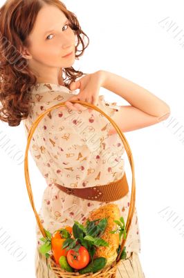 Closeup portrait of young caucasian woman with straw basket of f