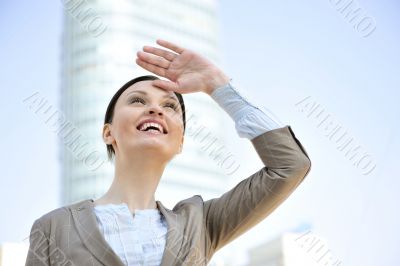 Portrait of a beautiful young businesswoman outside.