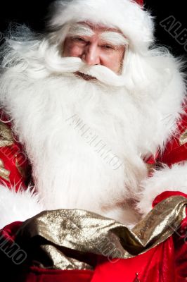Santa sitting at the Christmas room and looki