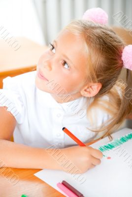 Little girl looking for a drawing conc