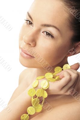 Pretty woman with yellow necklace