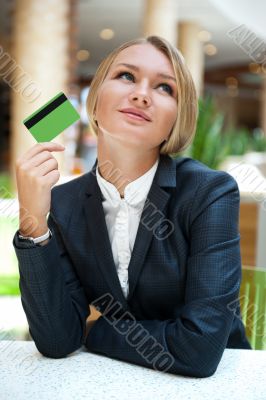 Closeup portrait of cute young business woman smiling while hold