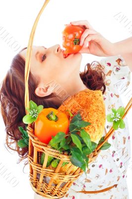 Closeup portrait of young pretty woman with basket of autumn har