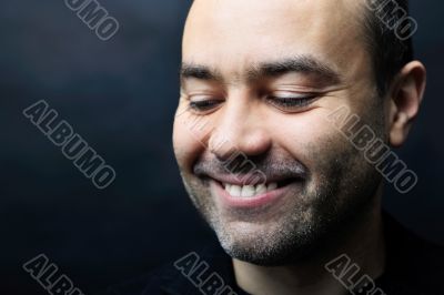 Closeup image of a happy aged man