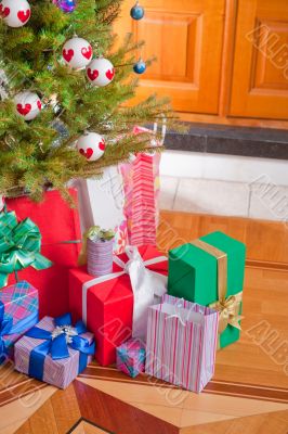 Christmas Tree and Christmas gift boxes in the interior