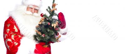 Christmas theme: Santa Claus holding christmas tree and his bag 