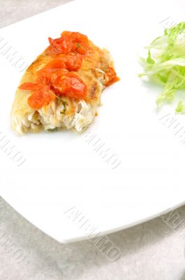 Pangasius fish with tomatoes