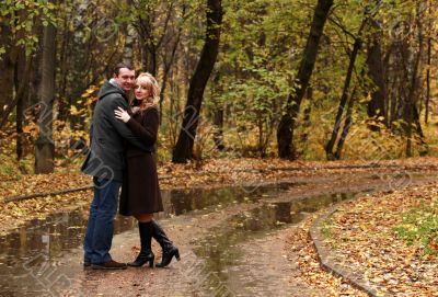 Pair in autumn park