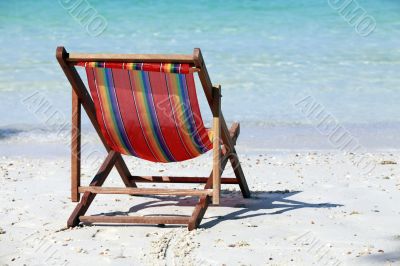 ï¿½haise lounge on a beach