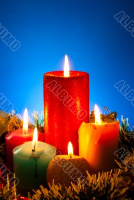Five burning colourful candles