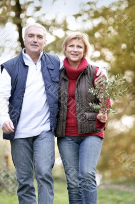 Couple taking a walk through woodland