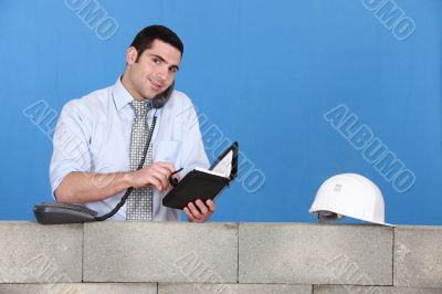 construction businessman talking on the phone