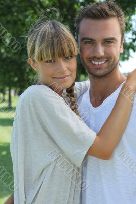 Portrait of a young couple in the countryside