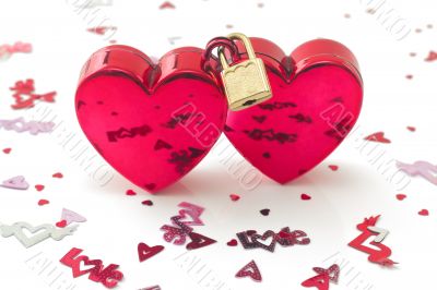 Wedlocked, two hearts locked,  with small decorations, isolated 