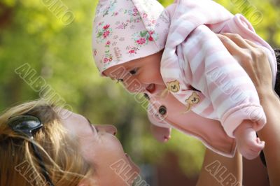Happy mum and her child