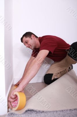 craftsman covering a floor