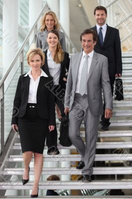 Group of colleagues descending stairs