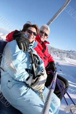 Old couple on aerial lift