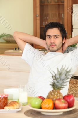 Man relaxing in kitchen