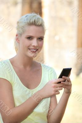 Woman sending a text message