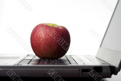 Apple On A Laptop