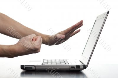 Man threatens his laptop