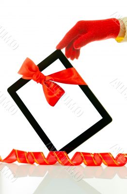 Hand wearing red gloves holding a tablet PC