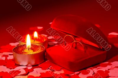 Two rings in a box and two candles