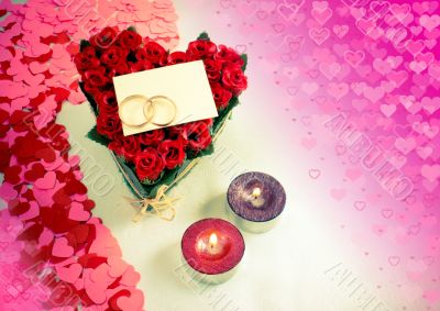Two rings and a blank card with two candles