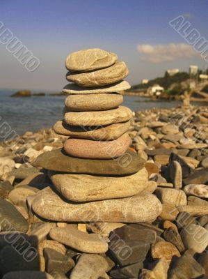 Balanced stones on the seashore